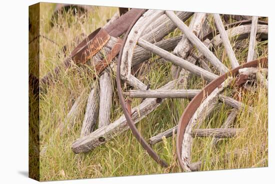 Old Wagon Wheels in Grass, Fort Steele, British Columbia, Canada-Jaynes Gallery-Premier Image Canvas