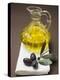 Olive Sprig with Black Olives, Carafe of Olive Oil Behind-null-Premier Image Canvas