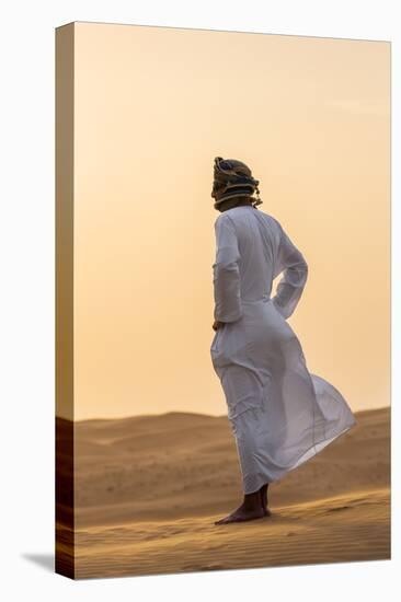 Oman, Wahiba Sands. an Omani Guide Enjoys the Sunset on Sand Dunes in Wahiba Sands.-Nigel Pavitt-Premier Image Canvas