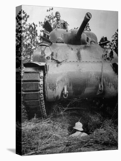 Oncoming View of Tank About to Pass over Foxhole in Which a Soldier is Crouched Down-Myron Davis-Premier Image Canvas