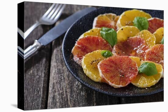 Orange Salad and Blood Orange Salad on Dark Plate-Jana Ihle-Premier Image Canvas