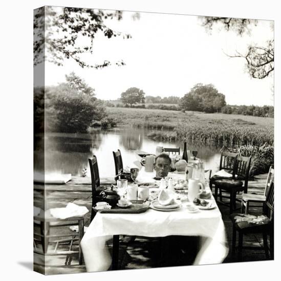 Outdoor Table Setting with Man's Head-Curtis Moffat-Premier Image Canvas