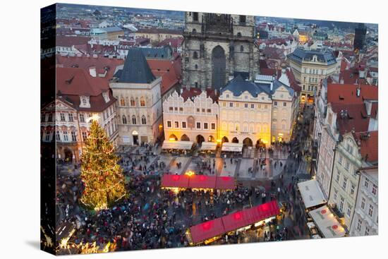 Overview of the Christmas Market and the Church of Our Lady of Tyn on the Old Town Square-Miles Ertman-Premier Image Canvas