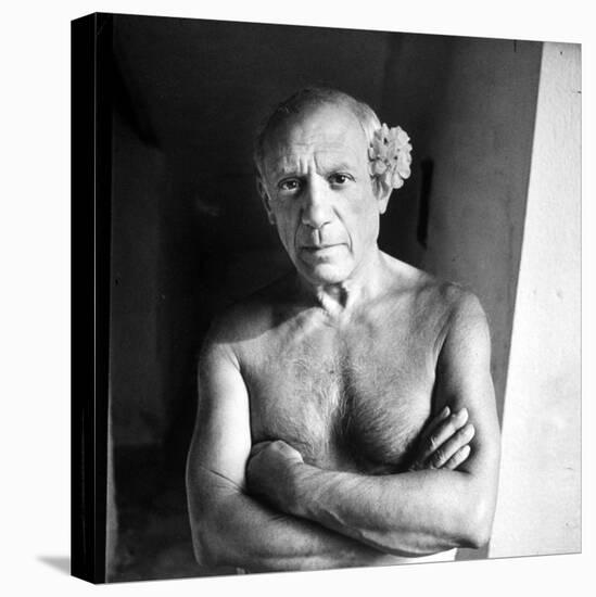 Pablo Picasso, Bare Chested and with Flower Tucked Behind Ear-Gjon Mili-Premier Image Canvas