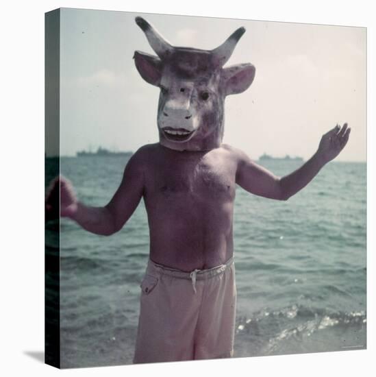 Pablo Picasso Wearing a Cow's Head Mask on Beach at Golfe Juan Near Vallauris-Gjon Mili-Premier Image Canvas