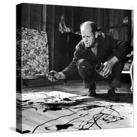 Painter Jackson Pollock Working in His Studio, Cigarette in Mouth, Dropping Paint Onto Canvas-Martha Holmes-Premier Image Canvas