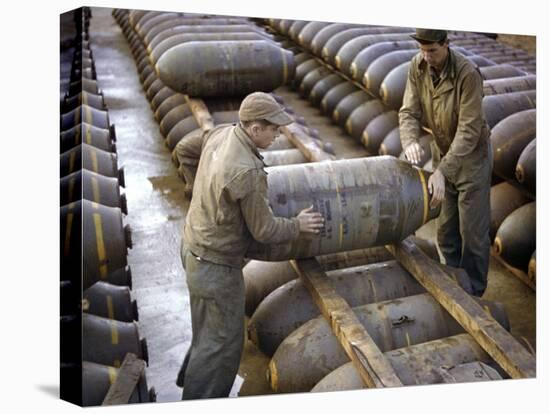 Pair of American Servicemen Moving a Large Bomb at an Ammunition Dump During WWII-null-Premier Image Canvas