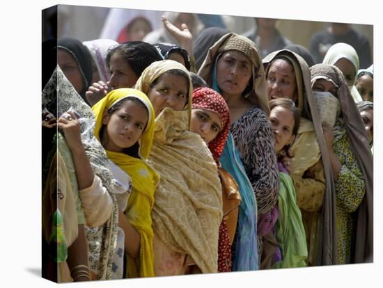 Pakistani Women Queue Up to Get Subsidized Sacks of Flour for the Holy Month of Ramadan-null-Premier Image Canvas