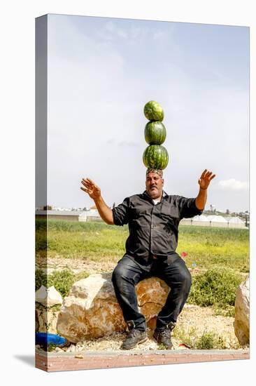 Palestinian selling watermelons at Al-Jalameh checkpoint on Israel-Palestine border, Palestine-Godong-Premier Image Canvas