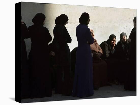 Palestinian Women Sit as They Mourn During the Funeral of Four Al-Aqsa Martyrs' Brigades Militants-null-Premier Image Canvas