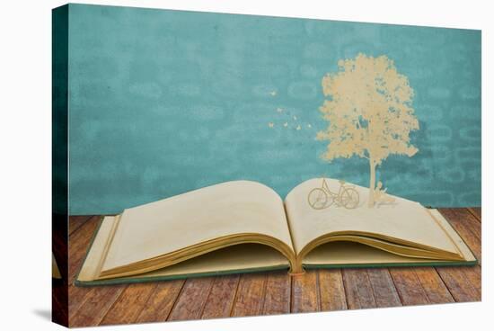 Paper Cut Of Children Read A Book Under Tree On Old Book-jannoon028-Stretched Canvas