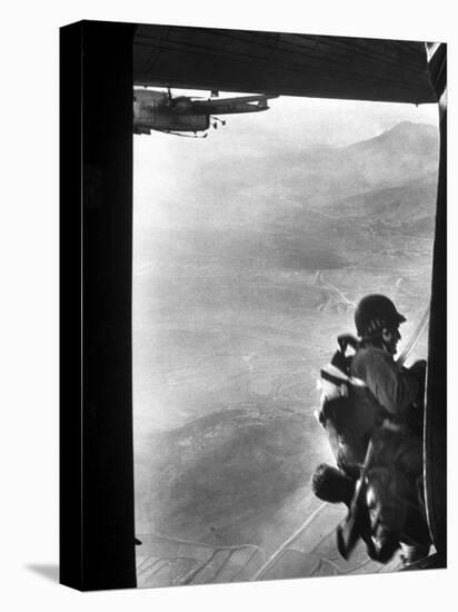 Paratrooper Making Way to Jump Off a Military Plane into Hostile Territories-John Dominis-Premier Image Canvas