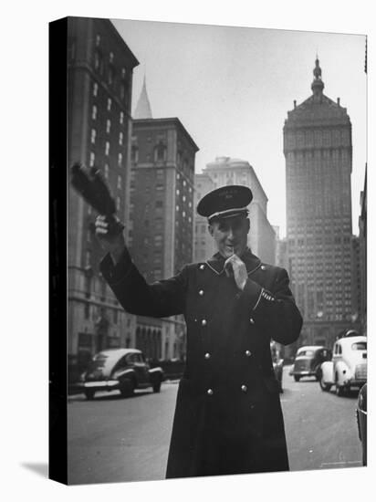 Park Avenue Doorman Using Whistle to Flag Down a Taxi For One of the Residents of His Building-William C^ Shrout-Premier Image Canvas