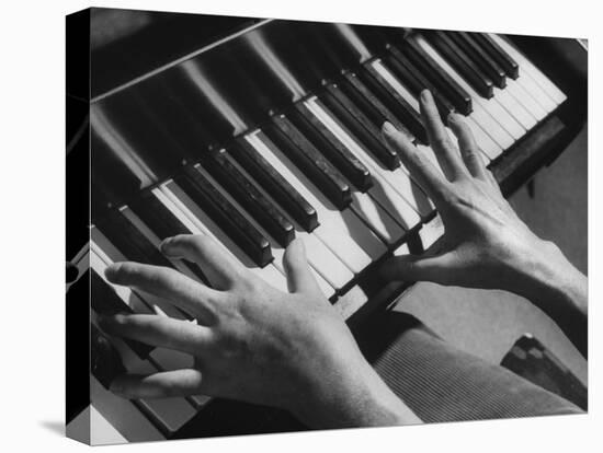 Patient Exercising Hands by Playing the Piano after Surgery-null-Premier Image Canvas