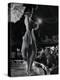 Patron at Stage-Side Table Looks Appraisingly at Tall Show Girl Standing at Edge of Stage-Gjon Mili-Premier Image Canvas