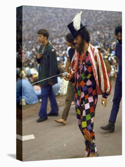 Paul Foster Walking During the Woodstock Music and Art Festival-Bill Eppridge-Premier Image Canvas