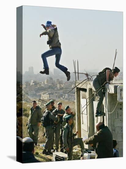 Peace Activist Leaps over Israeli Border Police Trying to Prevent Demolition of House, Jerusalem-null-Premier Image Canvas