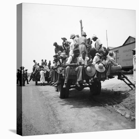 Peach pickers being driven to the orchards in Muscella, Georgia, 1936-Dorothea Lange-Premier Image Canvas