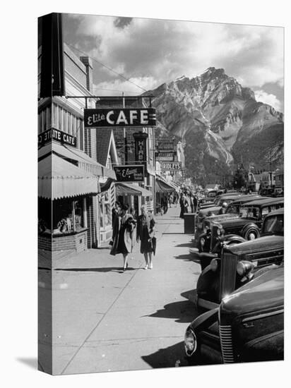 Pedestrians Walking Along Main Street in Resort Town with Cascade Mountain in the Background-Andreas Feininger-Premier Image Canvas