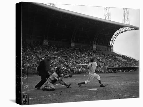 Pee Wee Reese Bats for the Brooklyn Dodgers During a Dodgers-Braves Game at Miami Stadium-null-Premier Image Canvas