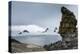 Penguins below dramatic rock formations, Half Moon Bay, South Sheltand Islands, Antarctica, Polar R-Michael Runkel-Premier Image Canvas