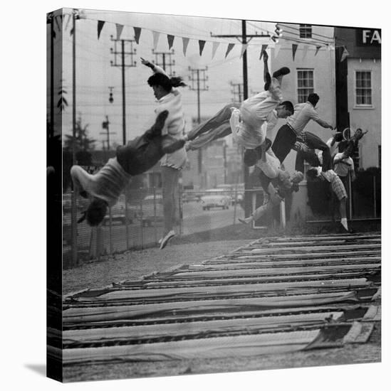 People Jumping in a Roadside Trampoline Park in LA called Jess Robinson's Trampoline Club-Ralph Crane-Premier Image Canvas