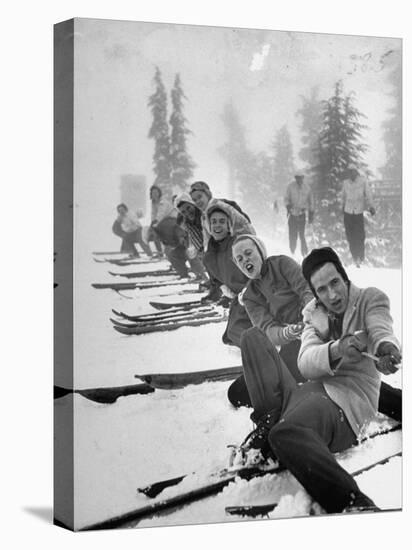 People Playing Tug of War During Snowstorm at Timberline Lodge Ski Club Party-Ralph Morse-Premier Image Canvas
