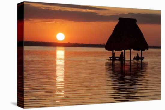 People Relaxing at Sunset, Lago Peten Itza, El Remate, Guatemala, Central America-Colin Brynn-Premier Image Canvas