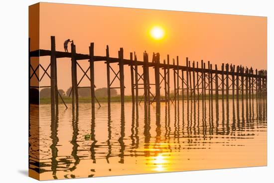 People walking on U-Bein bridge over Taung Tha Man Lake at sunset, Amarapura, Mandalay, Myanmar-Jan Miracky-Premier Image Canvas