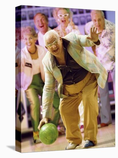 People Watching a Senior Man Bowling at a Bowling Alley-null-Premier Image Canvas