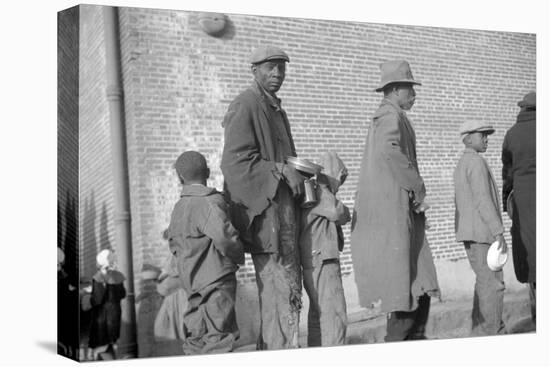 persones in the lineup for food at mealtime in the flood refugee camp, Forrest City, Arkansas-Walker Evans-Premier Image Canvas