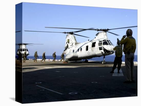 Personnel Walk into the Rear of a CH-46E Sea Knight Helicopter-Stocktrek Images-Premier Image Canvas