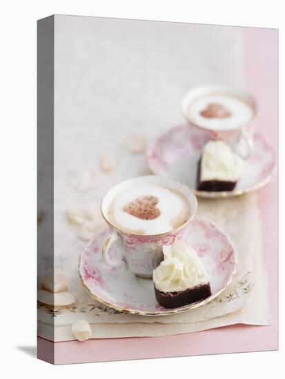 Petit Fours and Cappuccino Decorated with Cocoa Powder Hearts-Gareth Morgans-Premier Image Canvas
