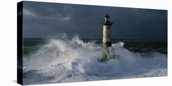 Phare d'Ar-Men lors d'une tempete-Jean Guichard-Stretched Canvas