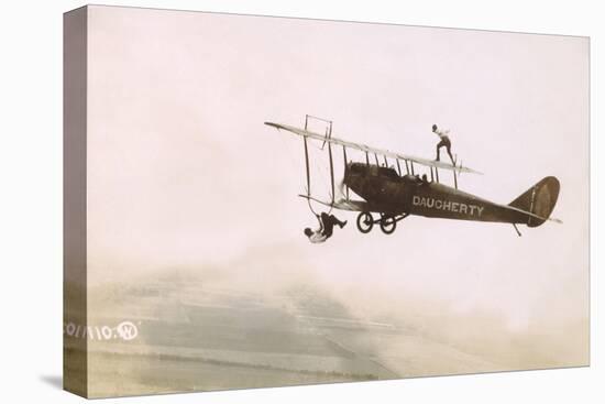 Photograph of a Wingwalkers on a Biplane-null-Premier Image Canvas