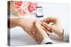 Picture of Man Putting Wedding Ring on Woman Hand-dolgachov-Premier Image Canvas