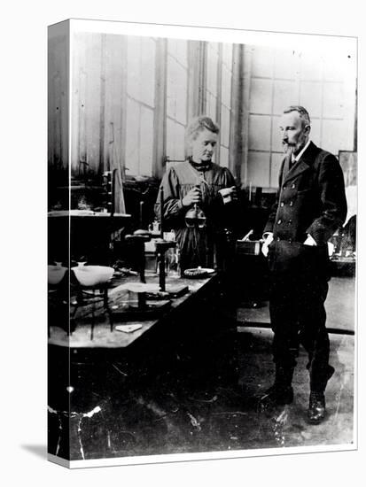 Pierre (1859-1906) and Marie Curie (1867-1934) in their Laboratory, c.1900-Valerian Gribayedoff-Premier Image Canvas