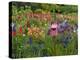 Pink Birdhouse in Flower Garden-Steve Terrill-Premier Image Canvas