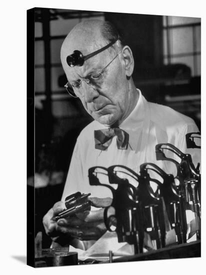 Pistol Engraver Harry Jarvis Disassembling Revolver at Smith and Wesson's Gunmaking Plant-Margaret Bourke-White-Premier Image Canvas