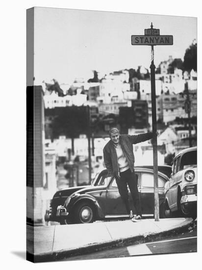 Poet Rod McKuen Swinging from Sign Which is Title of One His Songs, Stanyan Street-Ralph Crane-Premier Image Canvas