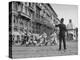 Police Officer Directing Traffic-Dmitri Kessel-Premier Image Canvas