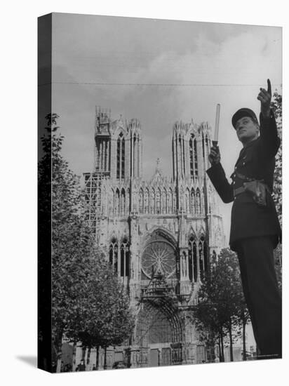 Policeman Directing Traffic in Front of the Reims Cathedral-Nat Farbman-Premier Image Canvas