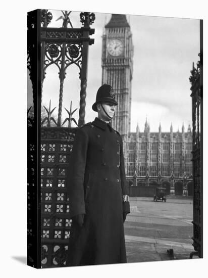Policeman on Duty Outside the Houses of Parliament and Big Ben in London-null-Premier Image Canvas