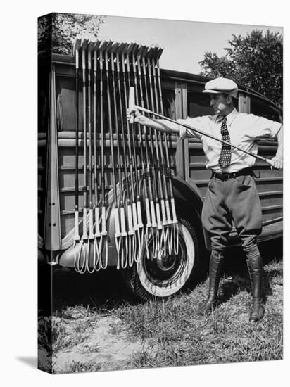 Polo Player Checking the Mallets-Alfred Eisenstaedt-Premier Image Canvas