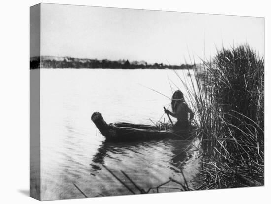 Pomo Indian Poling His Boat Made of Tule Rushes Through Shallows of Clear Lake, Northen California-Edward S^ Curtis-Premier Image Canvas