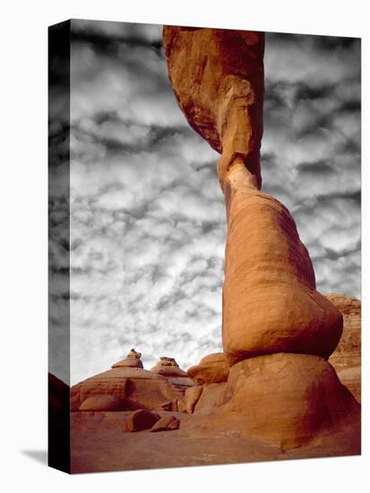 Portion of Delicate Arch Against Clouds, Arches National Park, Utah, USA-Jim Zuckerman-Premier Image Canvas