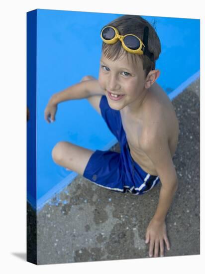 Portrait of 9 Year Old Boy Sitting at the Edge of the Swimming Pool, Kiamesha Lake, New York, USA-Paul Sutton-Premier Image Canvas