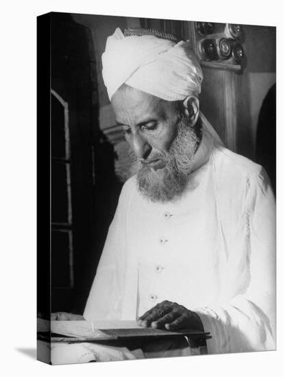 Portrait of a Moslem Imam Reading the Koran in the Jami' Masjid, the Largest Mosque in India-null-Premier Image Canvas