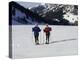 Portrait of a Senior Woman and a Young Woman Standing Wearing Skis-null-Premier Image Canvas