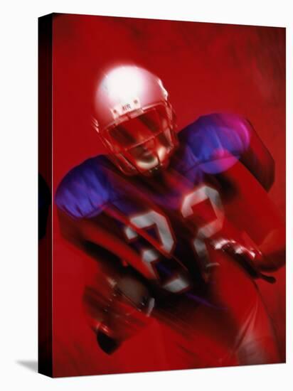 Portrait of an American Football Player Standing in a Tackle Pose-null-Premier Image Canvas